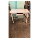 Wooden table with drawer