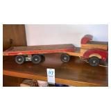 Wooden Knee Action Roll-A-Way toys truck