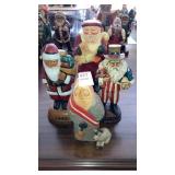4 Santa claus figures one as Uncle Sam