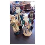 4 old world Santa Claus figures