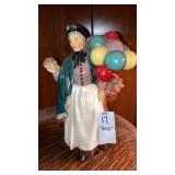 Heavy plaster chalkware flower seller balloon