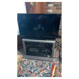 Magnavox 40" diag flatscreen TV w/ stand,VCR &