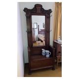 Heavy oak hall seat carved dog heads pediment