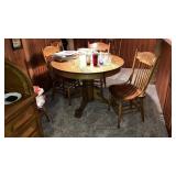 Oak pedestal claw foot table w/6 pressed back