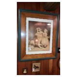 Large framed little girl giving her dog a biscuit