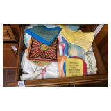 drawer of kitchen linens pot holders