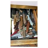 Kitchen drawer full of knives