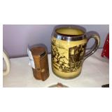 Stack set of shot glasses in leather sleeve,