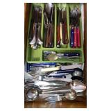 Flatware in rack-  in top drawer