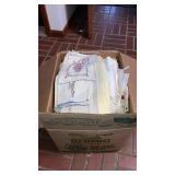 Large box full of embroidered linens table