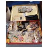Decorative tin of misc items: keys, patches...
