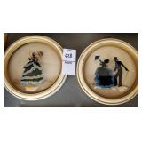 2 round hand painted curved glass silhouettes