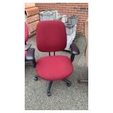 2 maroon desk chairs different sizes
