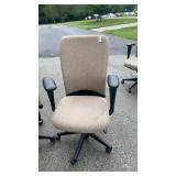 2 tan office chairs