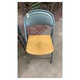 4 blue folding chairs