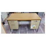 4 drawer metal desk.  55 inches x 30 inches