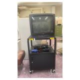 AV stand with 27 inch tv and other contents