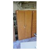 Wooden cabinet.  35 x 24 x  71 inches tall. With