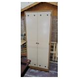 Metal cabinet with 1 metal and 2 wooden shelves.