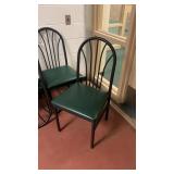 8 metal chairs with nice green cushion