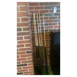 4 pool cues and bridge
