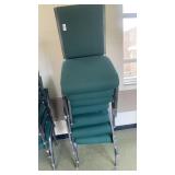 7 green padded  metal chairs