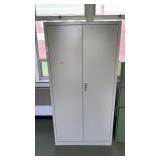 Metal cabinet with shelves 36 inches x 18 inches