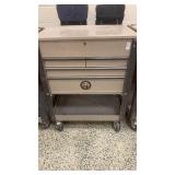 Napa tool box with drawers and open top lid . On