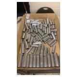 Tray lot of deep well metric sockets
