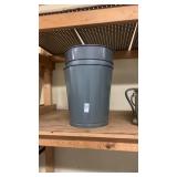 3 garbage cans , with box  of hoses