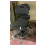 2 black adjustable desk chairs