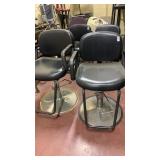 2 hairdresser raising chairs