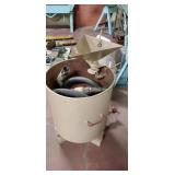 Large metal tank with hose and attachments