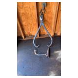 Blue log grapple hooks and log roller attachment