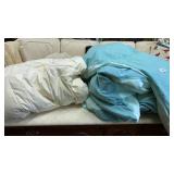 Two feathered comforters