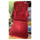 Red cushioned chair with ottoman