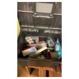 Plastic bin with office supplies