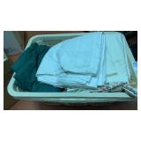 Bin of sheets, cloths