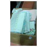 Box of linen, towels, cloth, etc