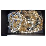 Box of assorted costume jewelry necklaces
