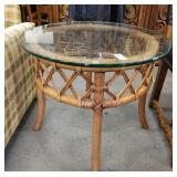 Glass topped round wicker table