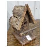Rustic bark birdhouse