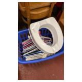 Lot of toilet seat and clothes hangers
