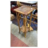 Woven wicker plant stand