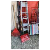 Lot of step ladders, beach chairs, and garden