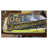 Stack of old license plates