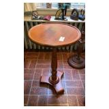 Small round wooden stand