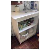 White kitchen stand on wheels