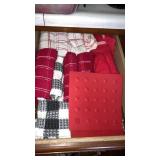 Drawer of kitchen tea towels silicone mats