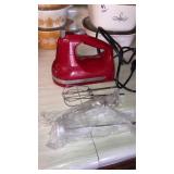 Red Kitchen Aid hand mixer